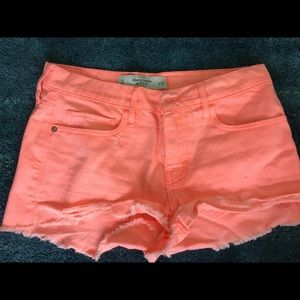 Coral pink high rise distressed high rise jean